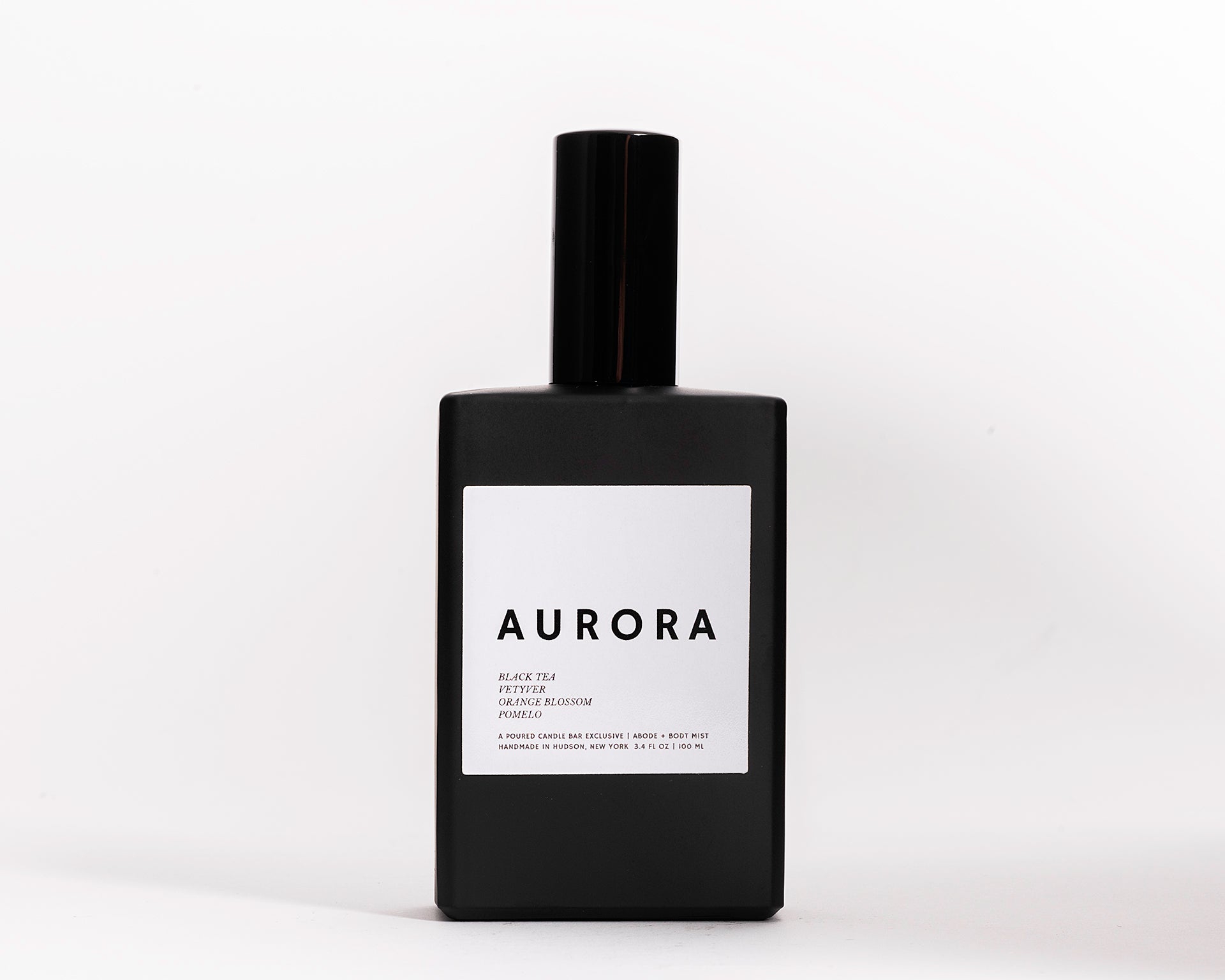 100 ml room spray in a black rectangular glass vessel. Profile Description: Faintly sweet + herbal, with subtle hits of white floral + citrus  Notes: Black Tea, Vetyver Root, Orange Blossom, Pomelo